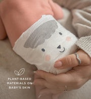 Baby wearing Kit & Kin plant-based newborn nappy