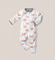 This Kit & Kin fox print baby all-in-one is made from GOTS-certified organic cotton, perfect for keeping newborns comfortable and cosy.