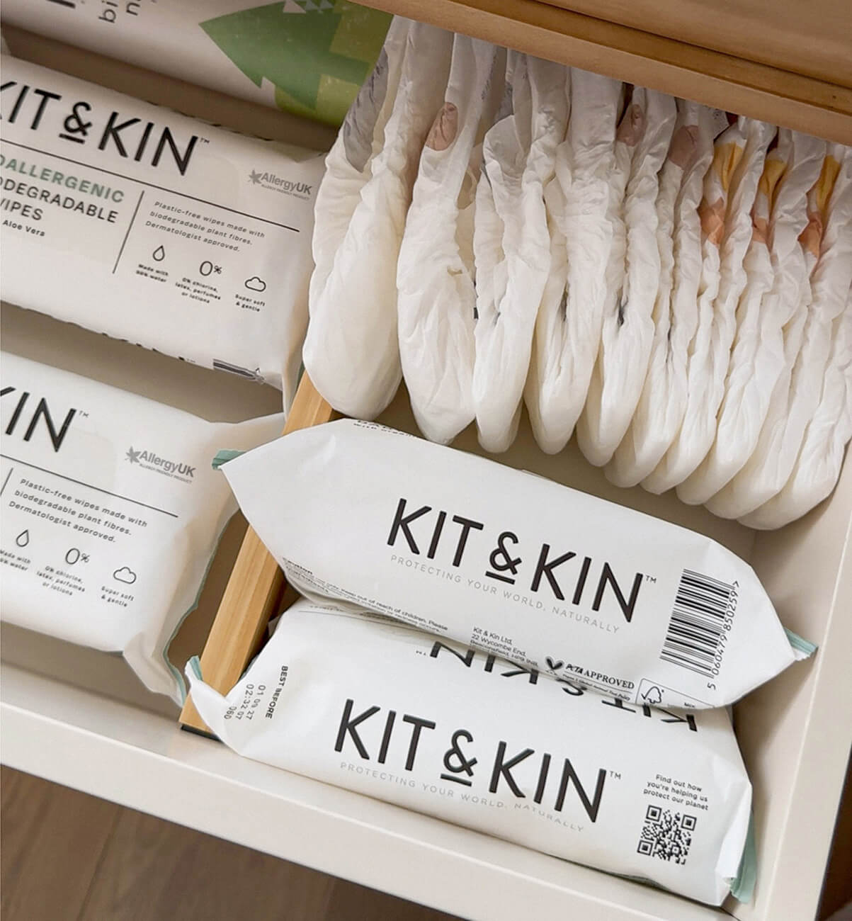 A nursery drawer full of Kit & Kin eco friendly wipes - the best wipes for newborns 