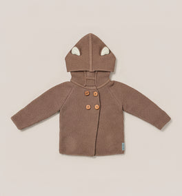A brown Kit & Kin bear baby cardigan crafted from GOTS-certified organic cotton, designed for newborn comfort and perfect for baby shower gifting. 