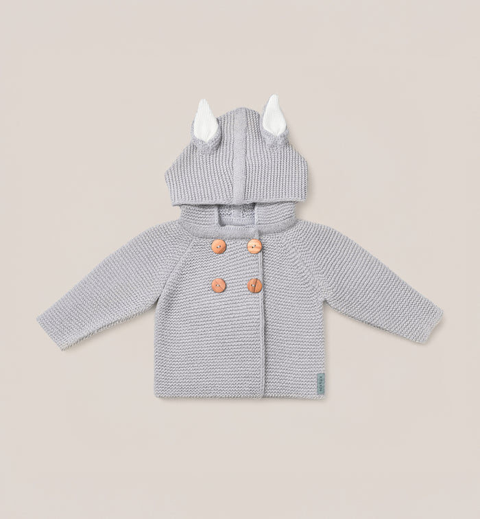 This Kit & Kin grey bunny baby hat is crafted from GOTS-certified organic cotton, designed for newborn comfort and thoughtful baby shower gifting.