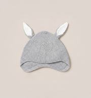 This Kit & Kin grey bunny baby hat is crafted from GOTS-certified organic cotton, designed for newborn comfort and thoughtful baby shower gifting.