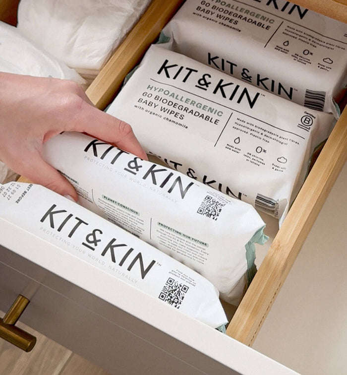 A pack of Kit & Kin hypoallergenic wipes for delicate skin, made with 99% water 